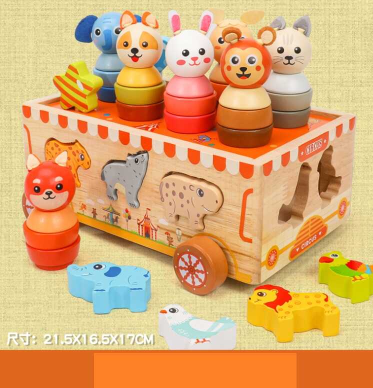 Каталка C 75300 (24) дерев’яна, сортер із фігурками тваринок, кілочки з кільцями та голови тваринок, в коробці