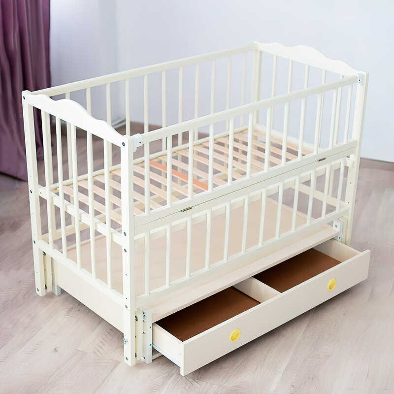 гр Ліжечко дитяче "Ангеліна" (1) шарнір-підшипник з відкидною боковиною+шухляда, бук (слонова кістка)